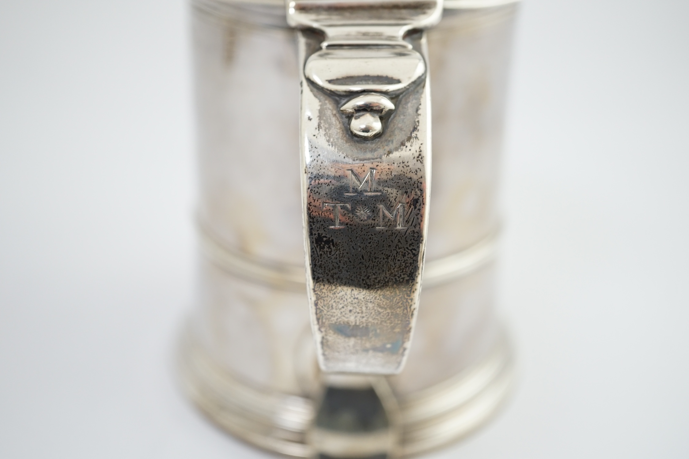 A George II silver tankard, indistinct maker's mark